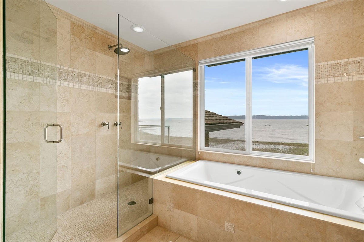Large shower and a beautiful tub to soak away any stress