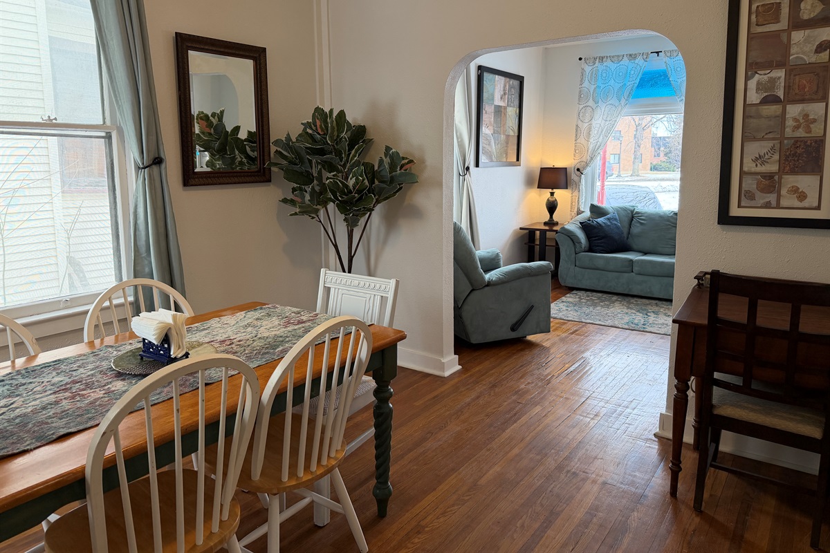 The dining room flows seamlessly into the living room.