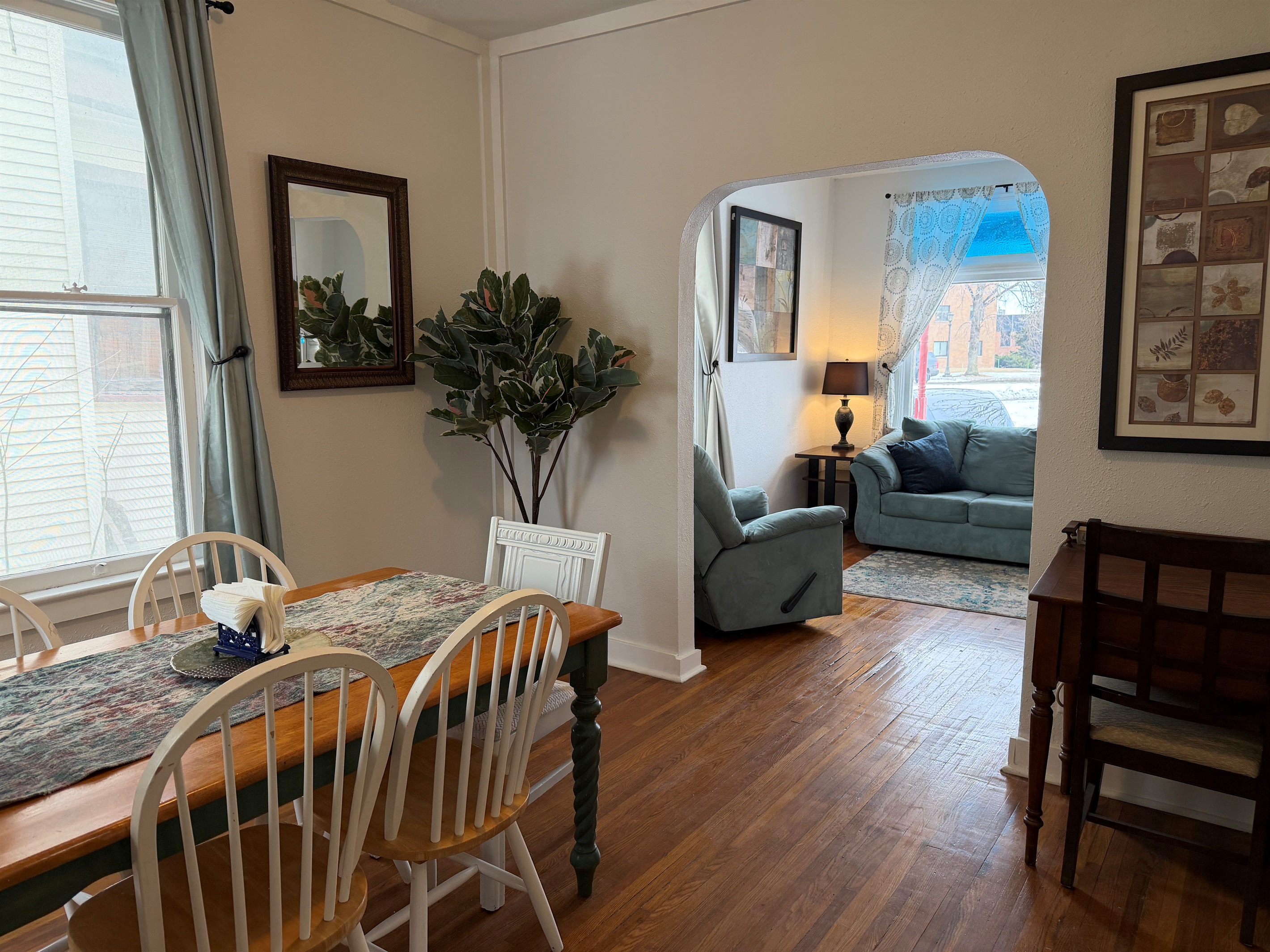 The dining room flows seamlessly into the living room.