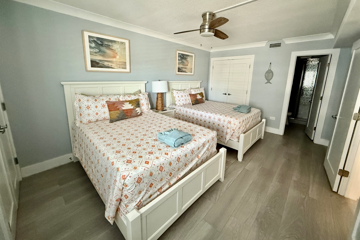 Guest Bedroom with Two Full Beds and En Suite Bath