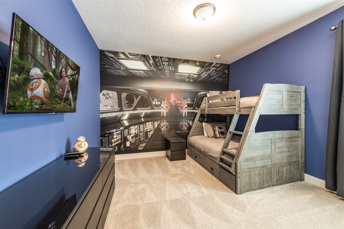 Step into this fun, Star Wars-inspired bunk bed bedroom, where adventure awaits!