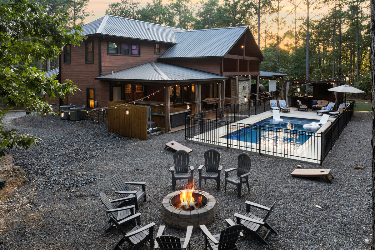 Step free access from the patio to the pool, cabana, 25x25 Turf Club, and outdoor spaces so everyone can comfortably enjoy the experience together at this resort-like retreat, Swim in the Pines. 🌲✨