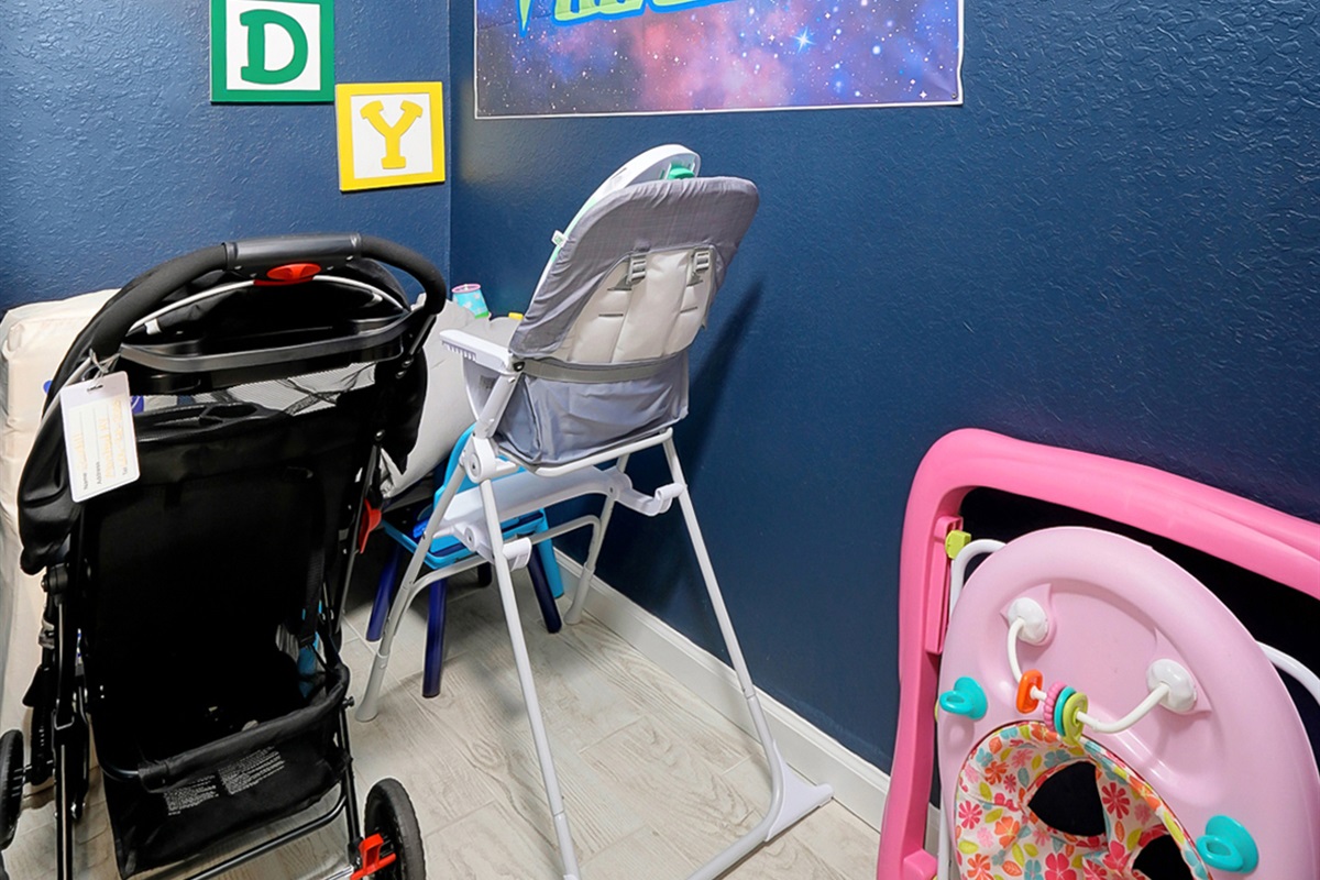 2 strollers, walker ,blankets and high chair