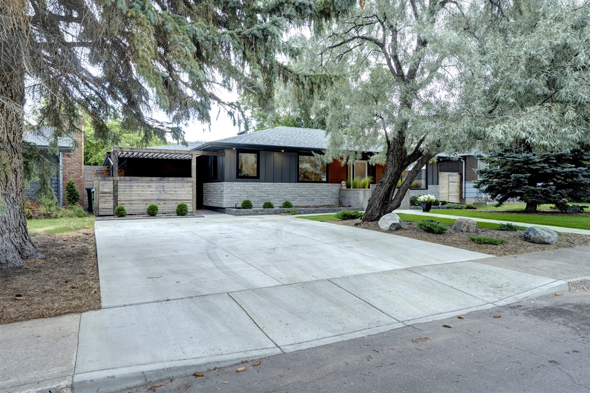 One spot on the left of the driveway and street parking available for guests.