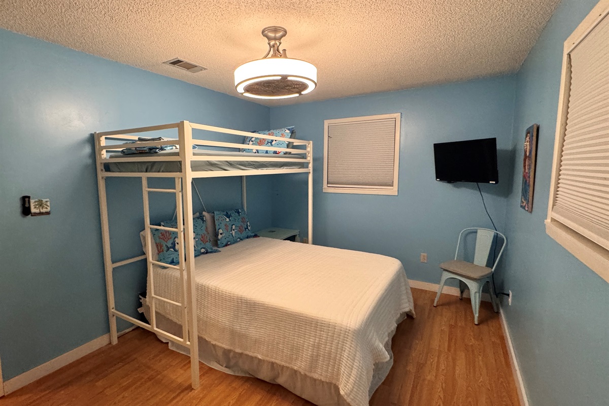 Queen bed with lofted twin.