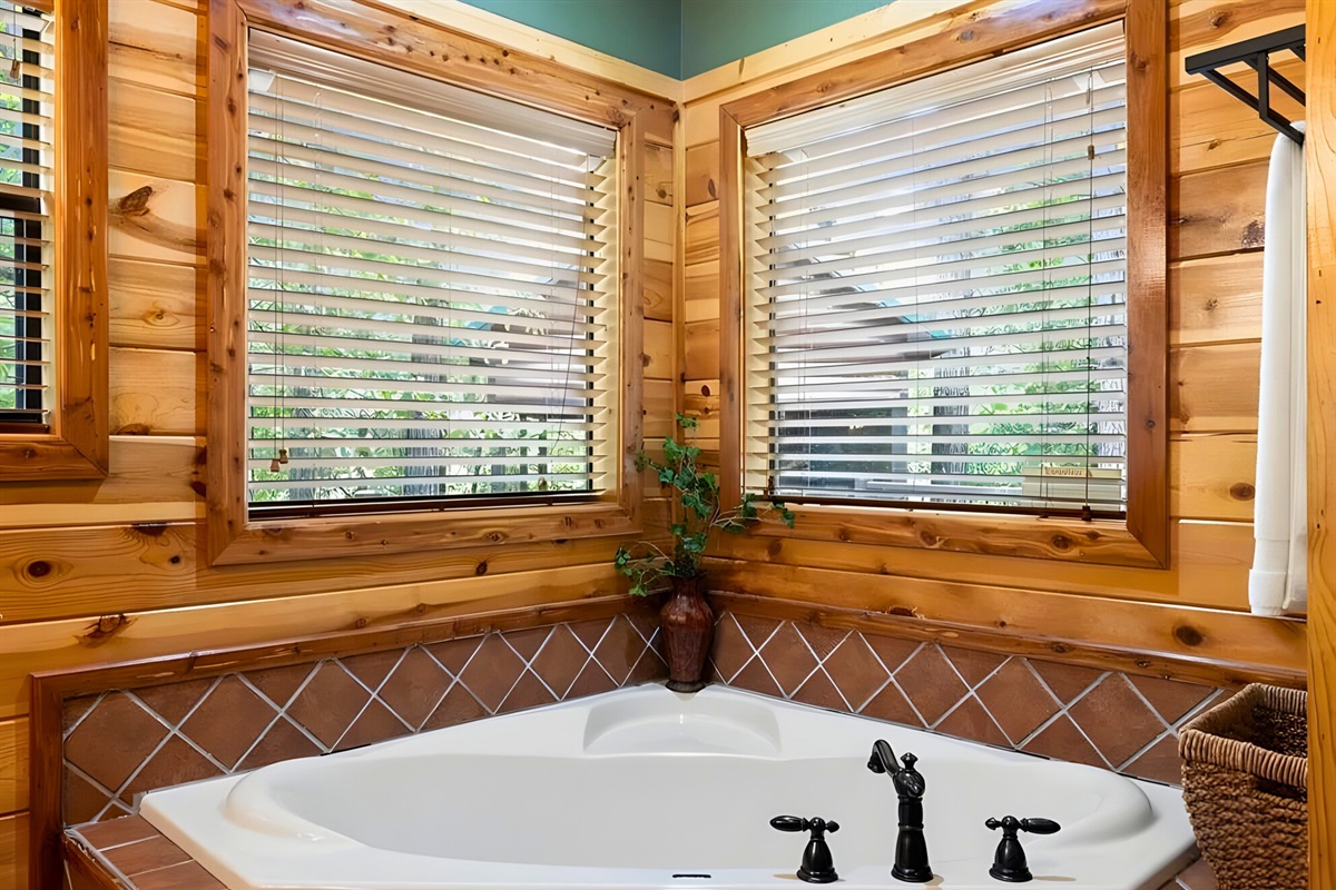 This soaking tub is the perfect place to unwind and relax.