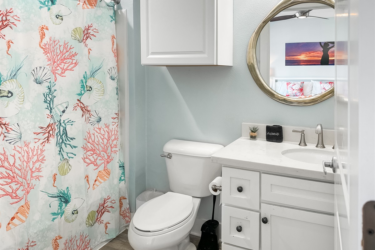 The bedroom comes with a full en-suite bathroom with a shower/tub combo.