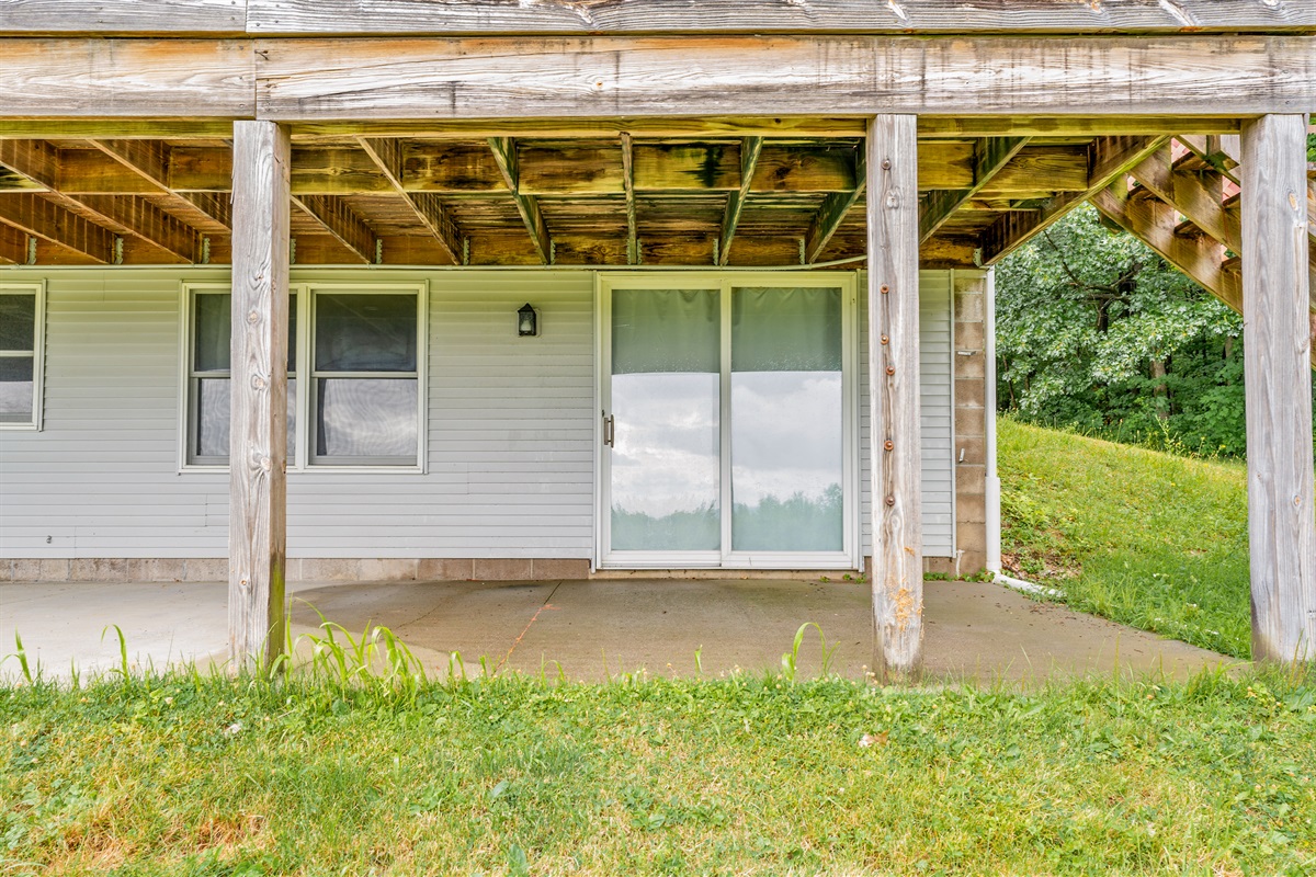 Ground-level access leads to bonus space—ideal for a workshop, rec room, or guest suite