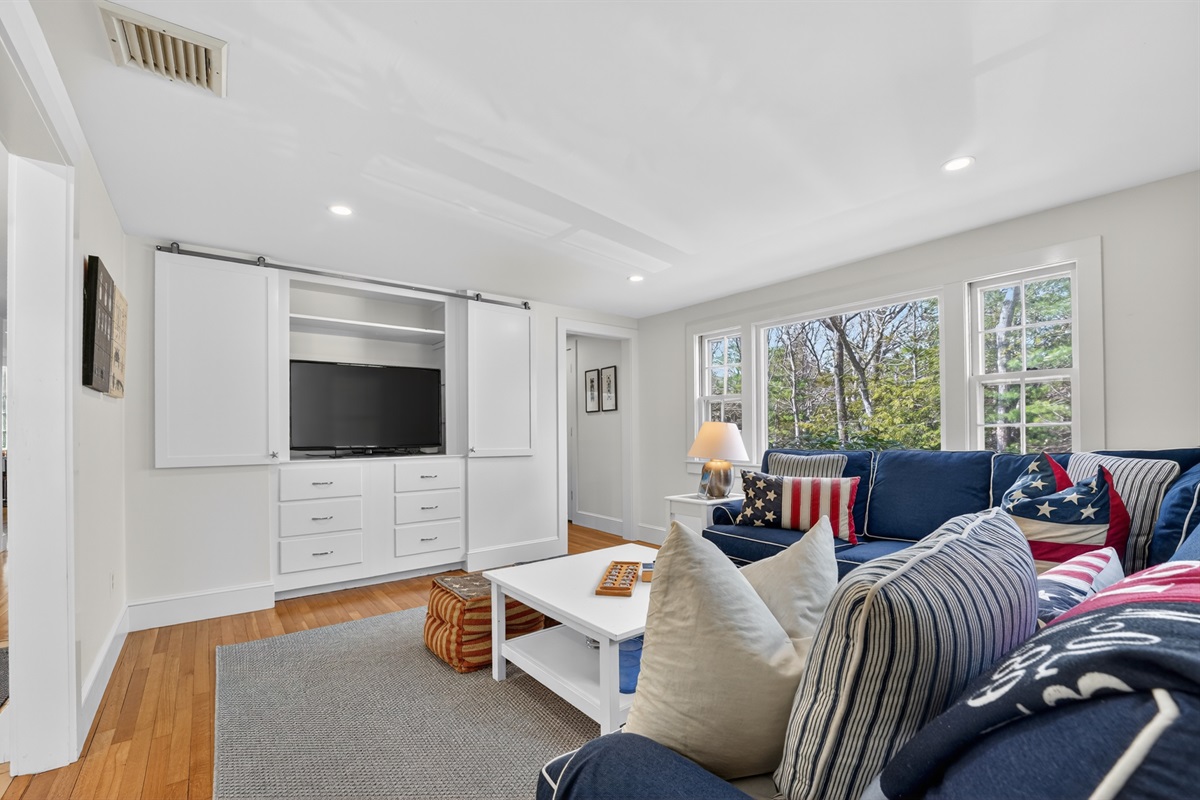 A comfy extra living area with TV for quiet moments!