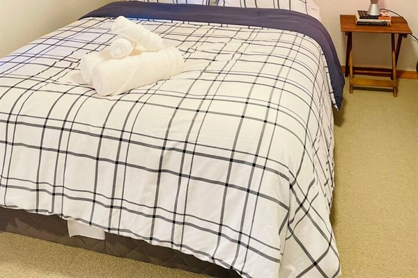 Invinting bedroom designed for a peaceful night's sleep.
