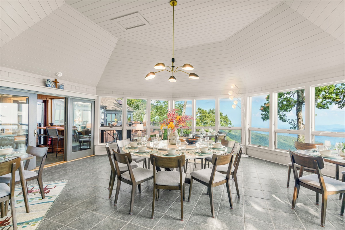 Dining room with seating for 20, glorious views, fireplace, and TV
