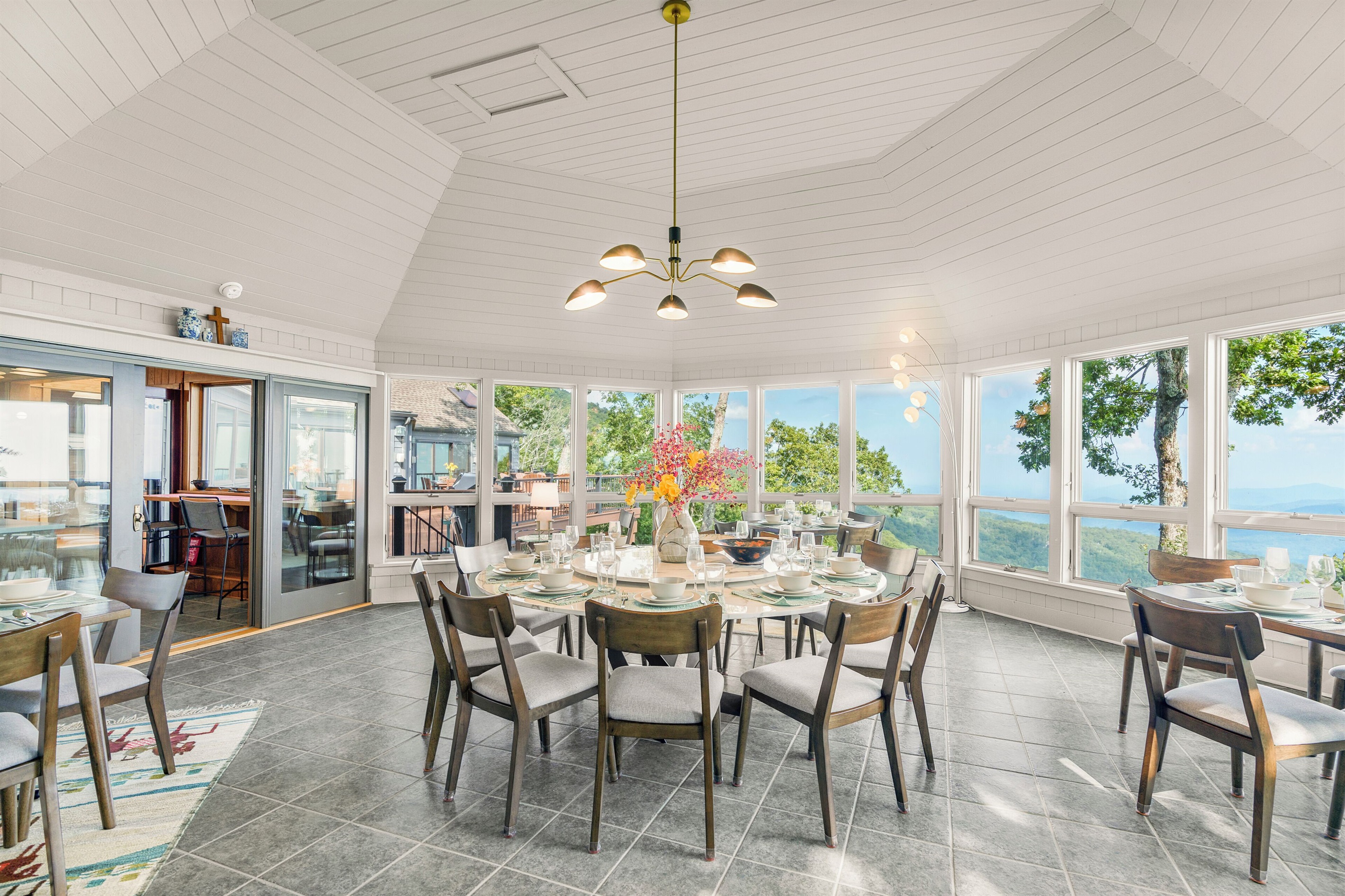 Dining room with seating for 20, glorious views, fireplace, and TV
