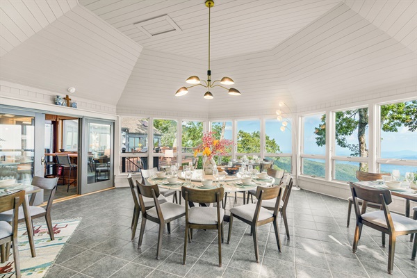 Dining room with seating for 20, glorious views, fireplace, and TV
