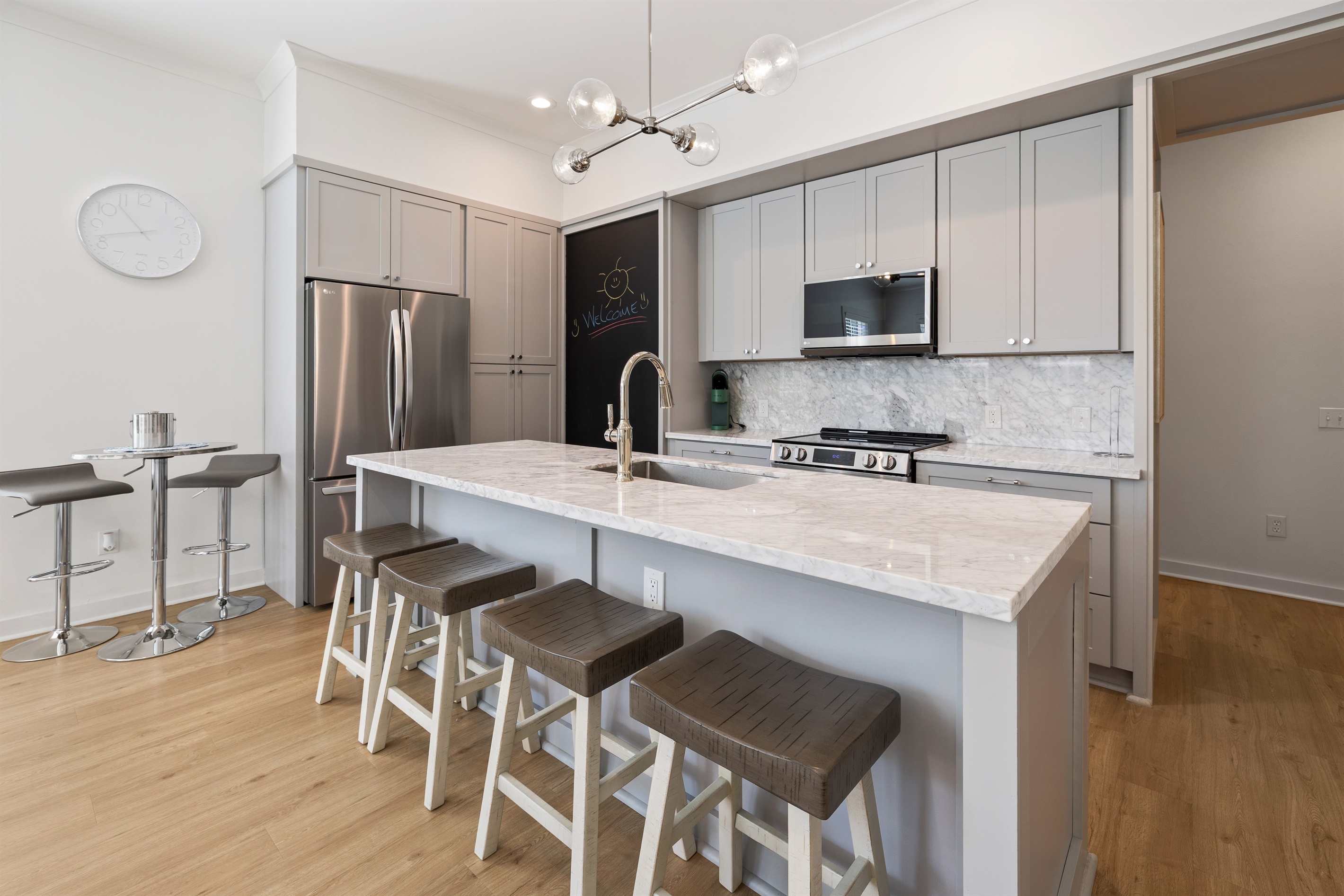 njoy meals together in this inviting open kitchen and dining area.
