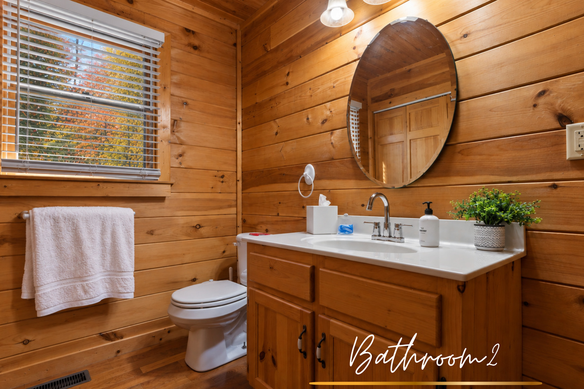 This bathroom blends forest vibes with everyday luxury.