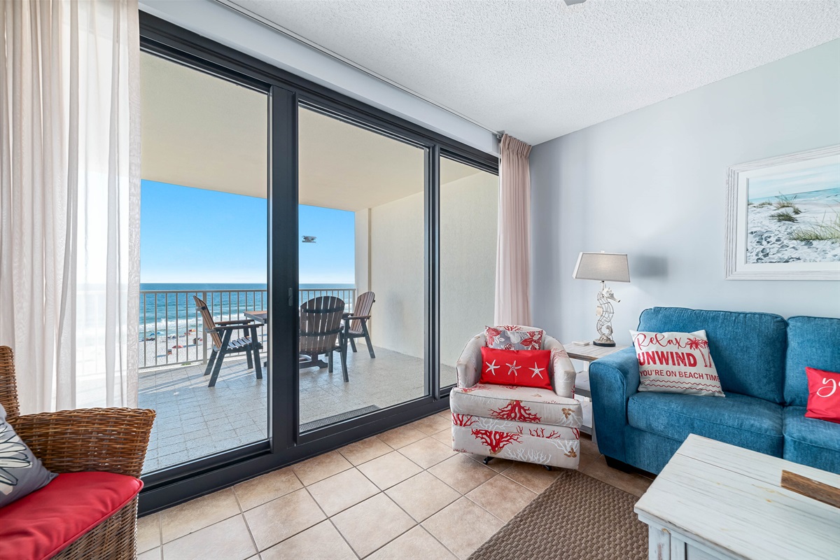 Coastal-inspired decor enhances this peaceful reading or relaxation spot, with the allure of the ocean just steps away.