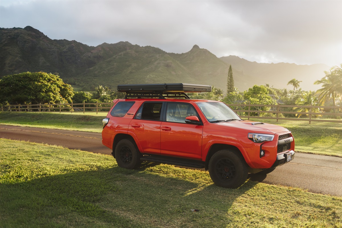 Orange Toyota 4Runner rooftop camper rental on Kauai