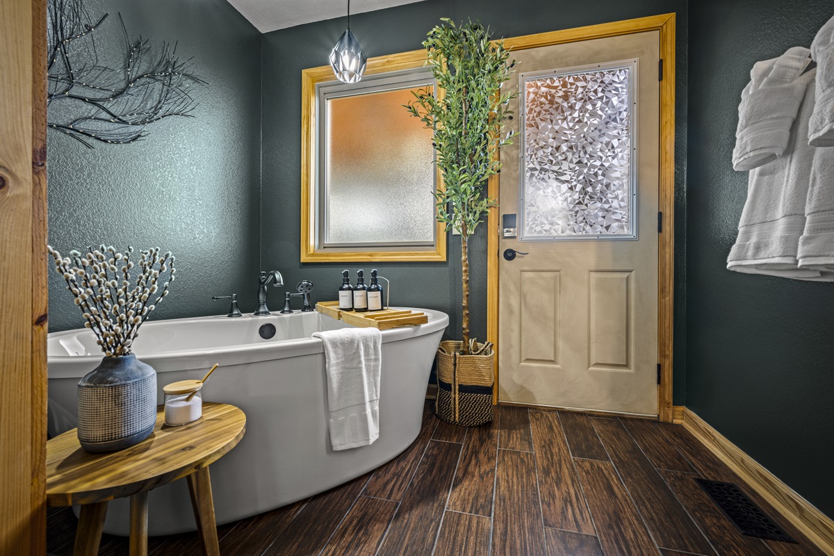 Enjoy a relaxing soak in the en-suite bathroom’s tub