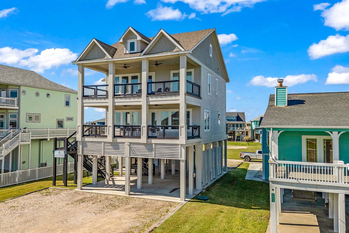 Costa Cristal Exterior: Elegant and contemporary, this home features bold architecture, large sunlit windows, and a refined exterior that captures both style and sophistication.