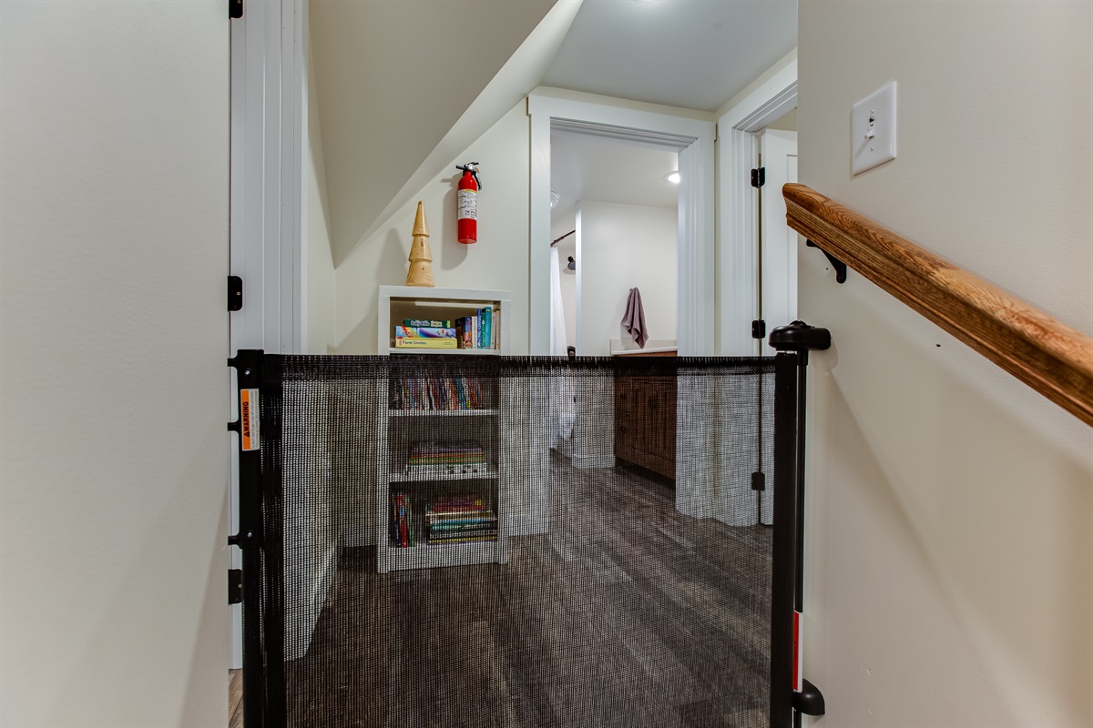 The main stairway has a retractable gate at the top and bottom.  We also provide baby gates that you can place in any doorway.