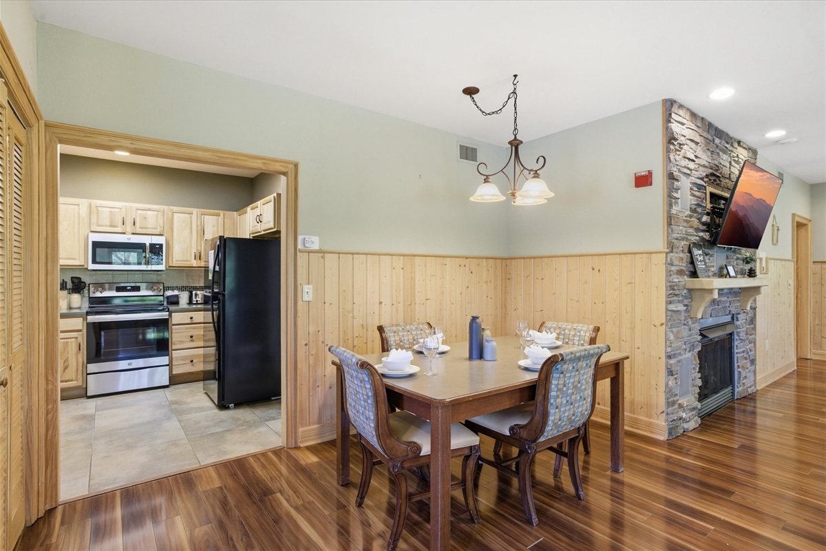 Enjoy meals together in this dedicated dining space with seating for four, set just off the main living area. With great lighting and an open feel, it’s perfect for everything from morning coffee to relaxed dinners.