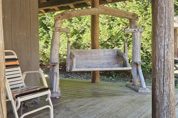 Enjoy the views from this amazing hand carved wood swing after a long soak in the hot tub! 