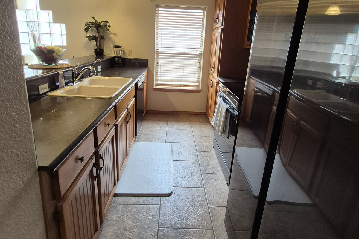 Galley kitchen opens to the main living area with all of the standard amenities