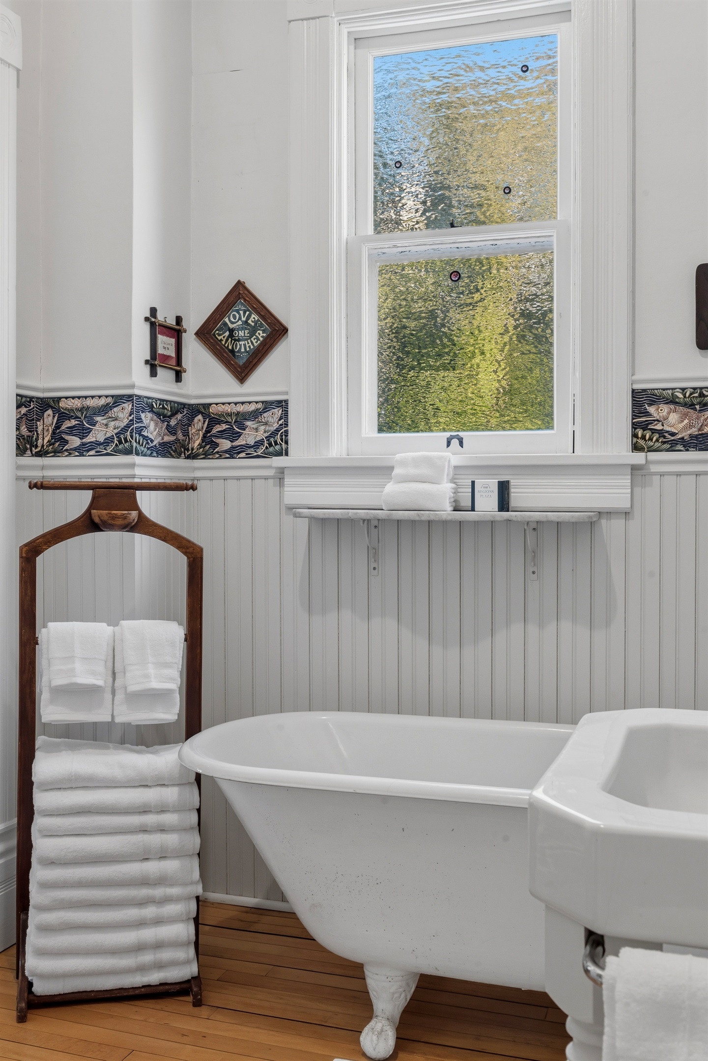 Bathroom amenities neatly arranged beside the sink