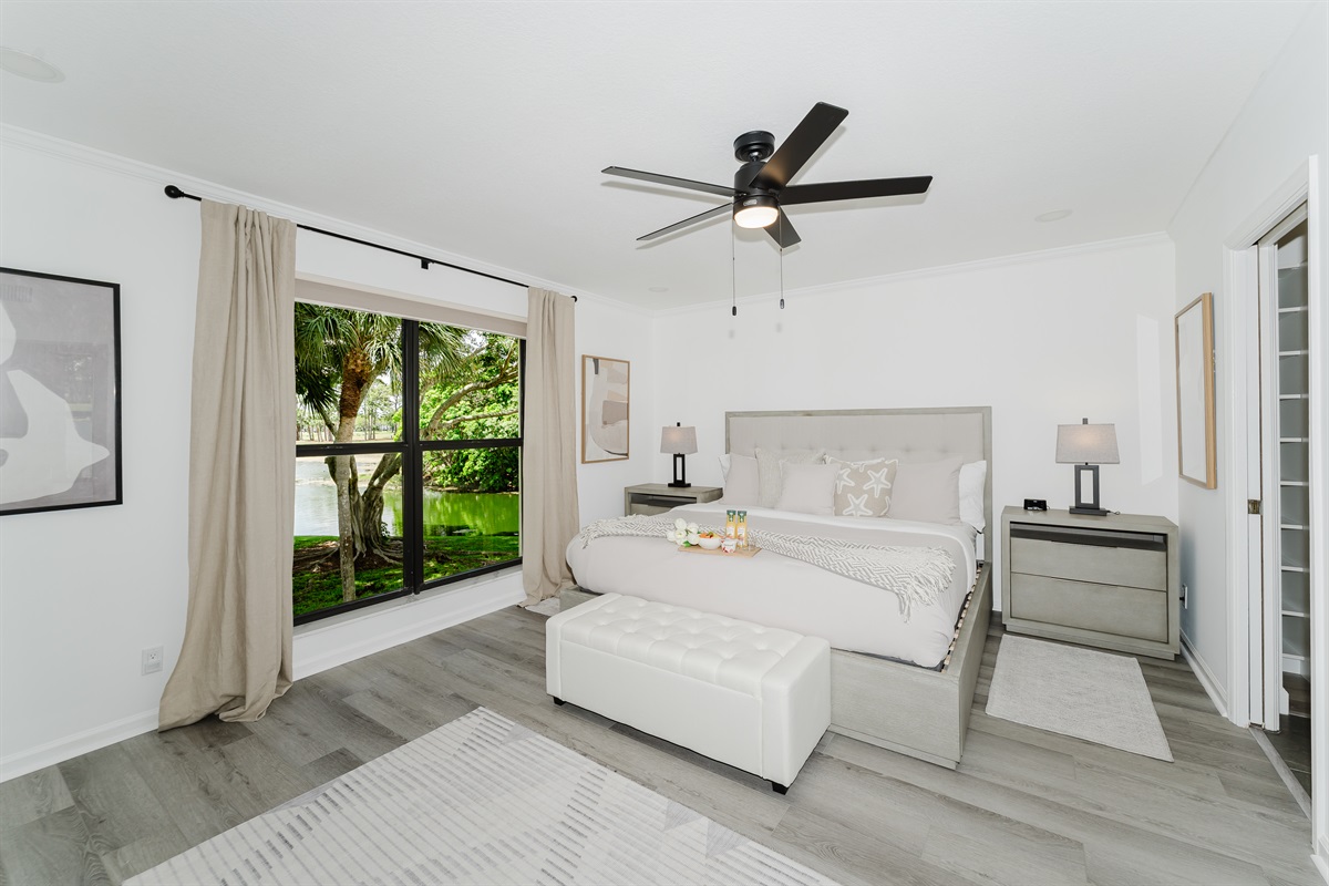 Spacious primary suite with a comfortable king bed and a serene atmosphere. Relaxing retreat designed for restful nights and peaceful mornings. Thoughtfully designed bedroom with hotel-quality comfort