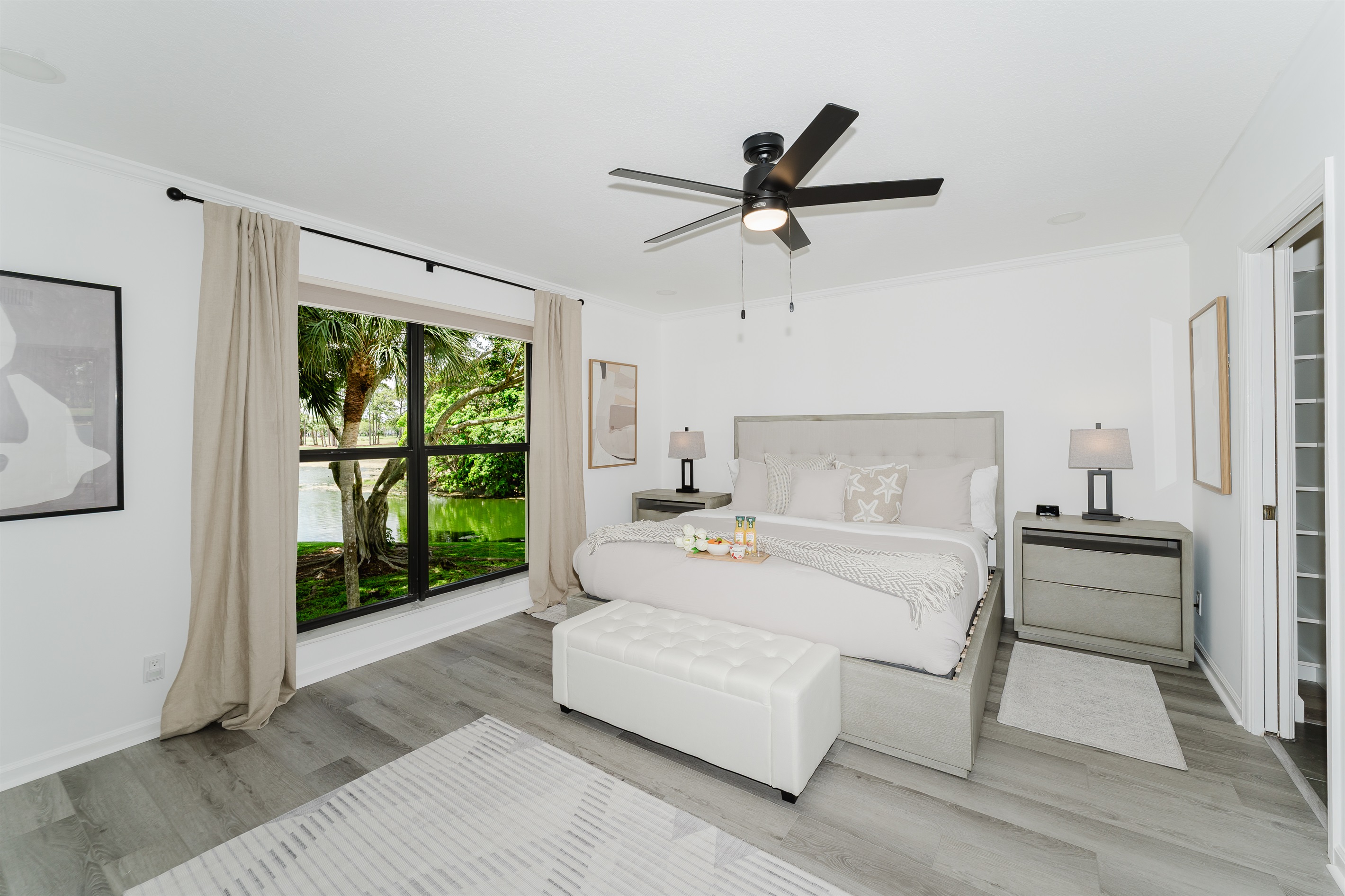 Spacious primary suite with a comfortable king bed and a serene atmosphere. Relaxing retreat designed for restful nights and peaceful mornings. Thoughtfully designed bedroom with hotel-quality comfort