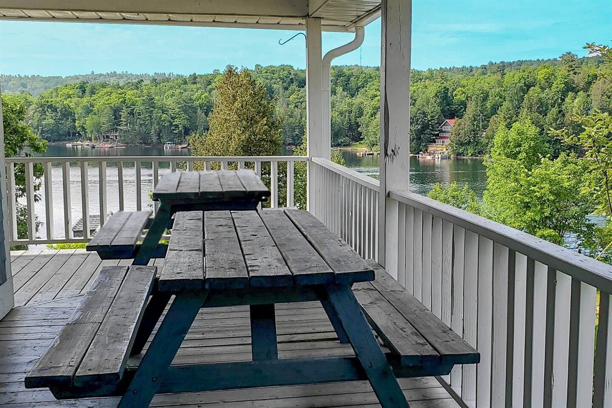 Seating on veranda with view of Lac McGregor
