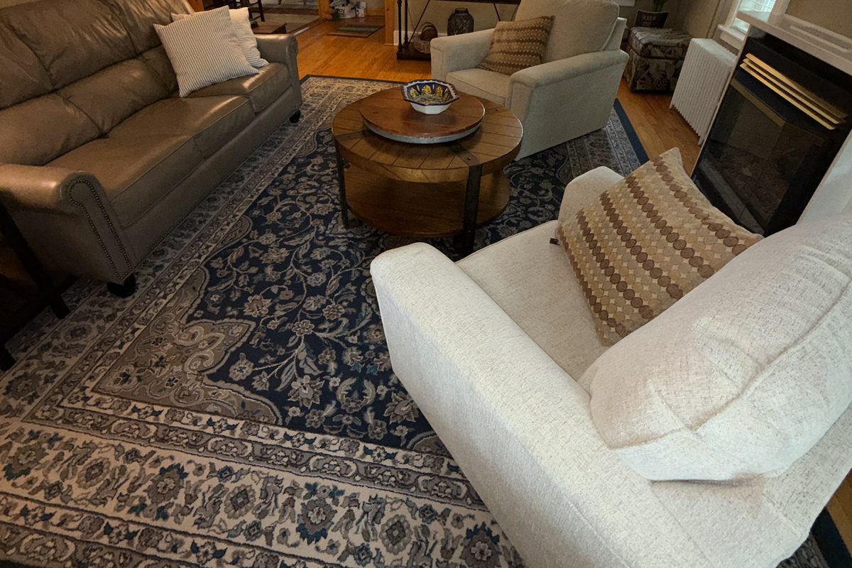 Warm and inviting living room with comfortable seating, a cozy fireplace, and plenty of space to relax and unwind.