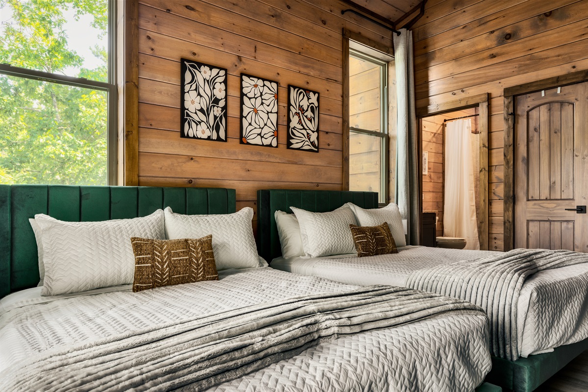 Bedroom 5 :2 Queen beds on second floor with 58 inch Roku HDTV with en suite full bathroom and private deck