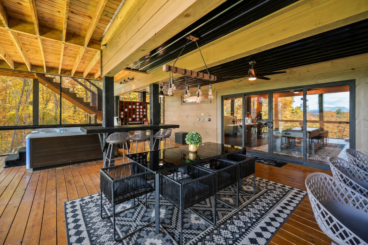 An elegant outdoor dining space perfect for sharing meals and making memories. Dinner tastes better with this backdrop.