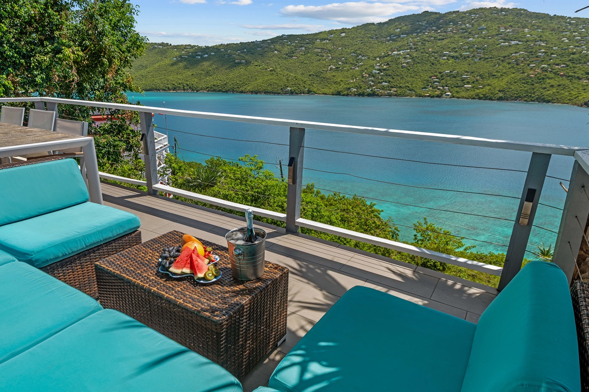 Lounge seating on the balcony off of the living room.
