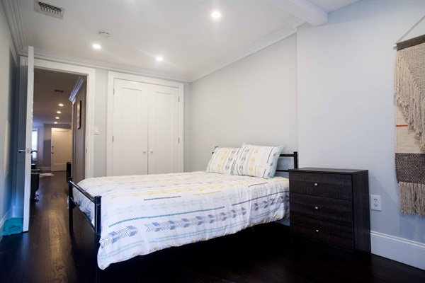 First bedroom. The mattress & pillows are Queen Hybrid Performance Firm Top Mattress Sealy Immersion™ Advanced Memory + Posturepedic Technology. Guests have commented favorably.