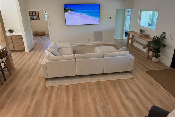 View of living room from stairs. Bunk room to the left and king bedroom 3 to the right