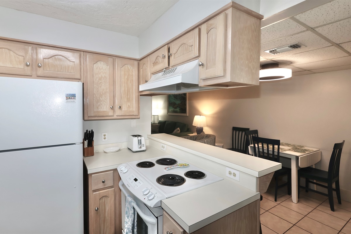Kitchen with breakfast bar seating for 4