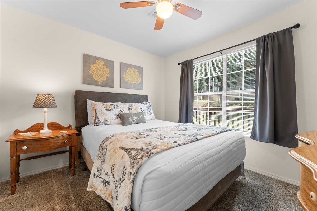 A separate queen bedroom gives couples, kids, or friends their own quiet space at the end of the day.