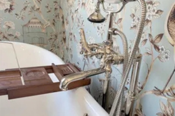 Vintage-style fixtures and the freestanding tub make this feel extra special.