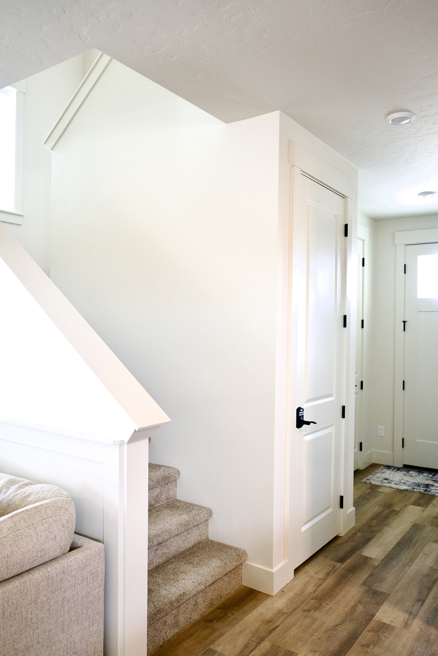 Downstairs, you’ll find a fully stocked kitchen, a spacious open-concept living room, a convenient half bathroom, and a comfortable downstairs bedroom, all thoughtfully arranged to create a welcoming and functional living space.