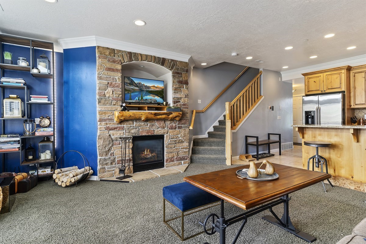 A cozy yet refined gathering space with custom built-ins and elegant finishes, perfectly suited for intimate evenings or entertaining guests in style.