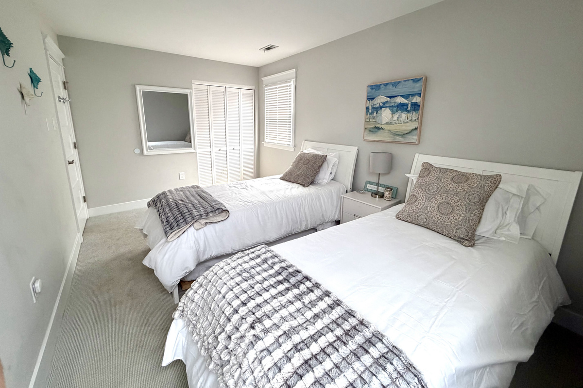 Two twin sized bed with twin trundles