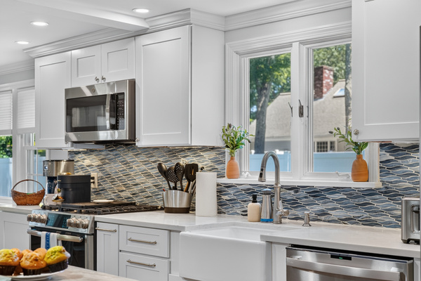 Spacious kitchen with stainless steel appliances and an open, functional layout.