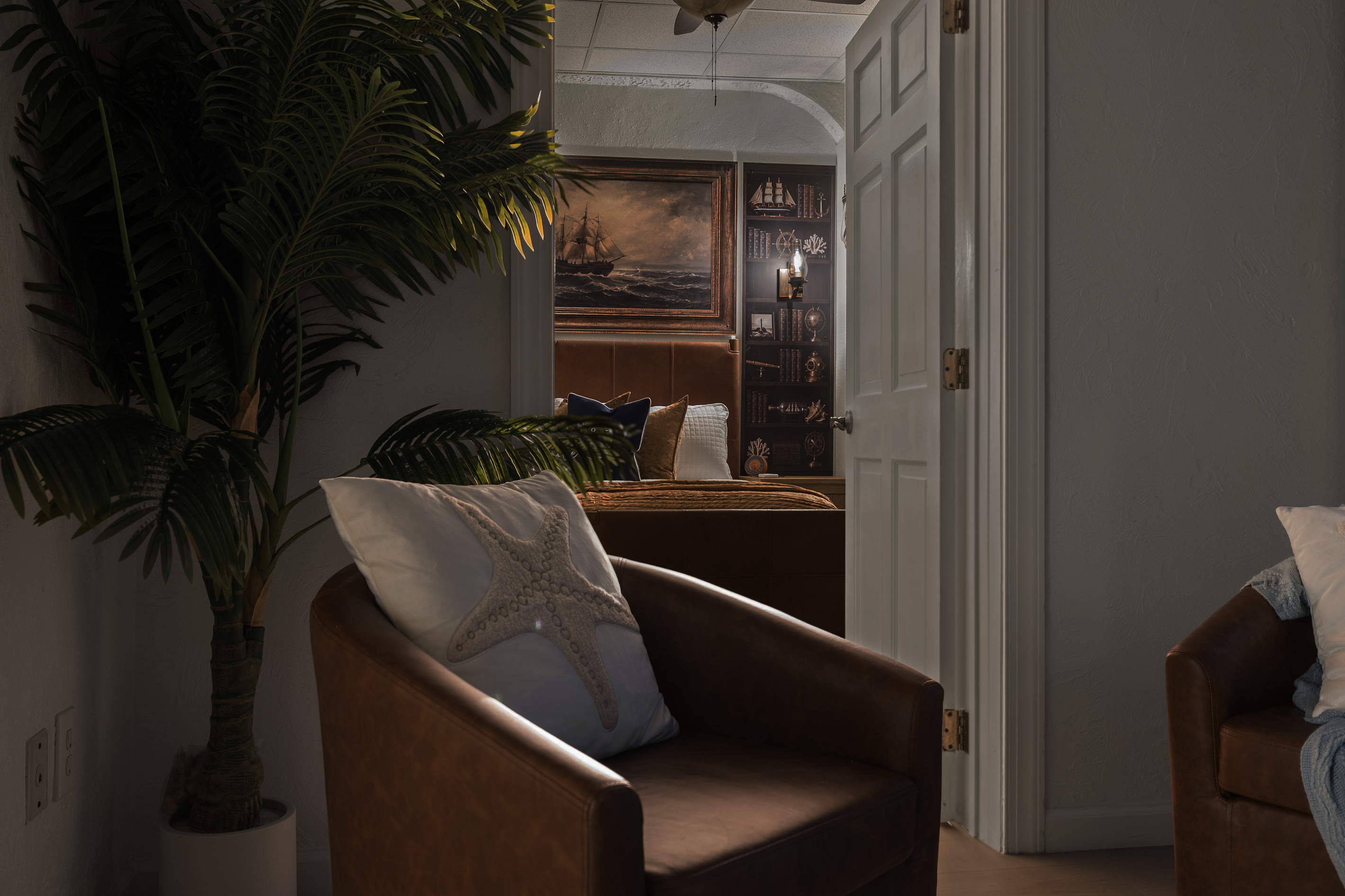 Outside the Captain's Quarters bedroom is a lounge area.