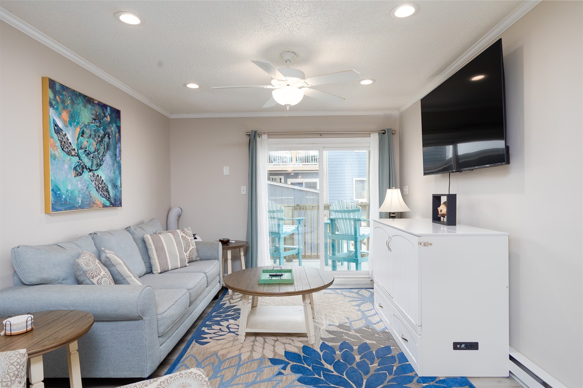 Awesome living space with murphy bed and 65" TV