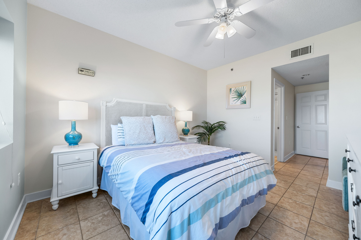 Unwind and recharge in this peaceful bedroom, designed with comfort and a serene ambiance in mind.