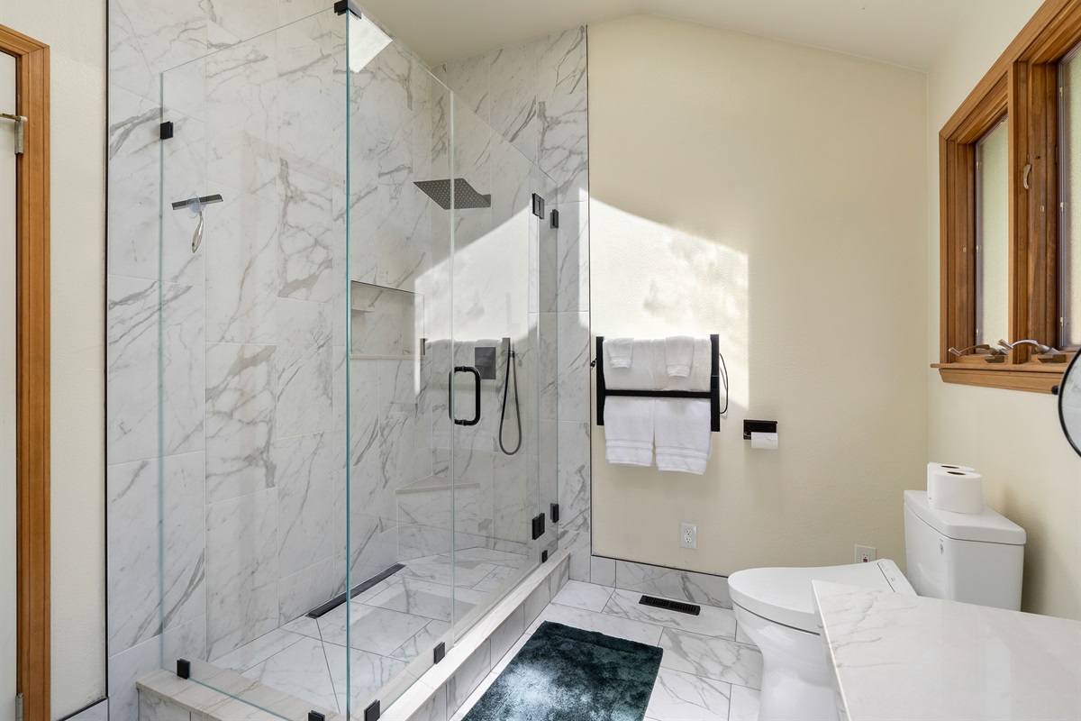 Bright ensuite bath for a spa-like refresh.