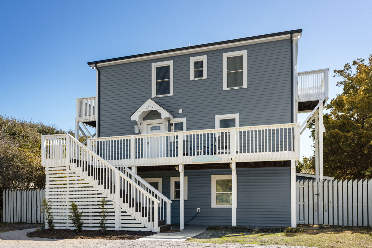 Welcome to your coastal getaway featuring spacious decks, multiple balconies, and private outdoor living spaces