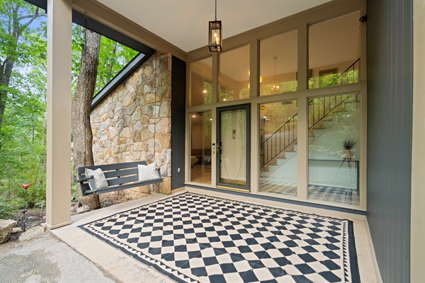 Covered front entrance porch.
Note: lower windows have a sheer curtains (not shown in photo) for added privacy. 